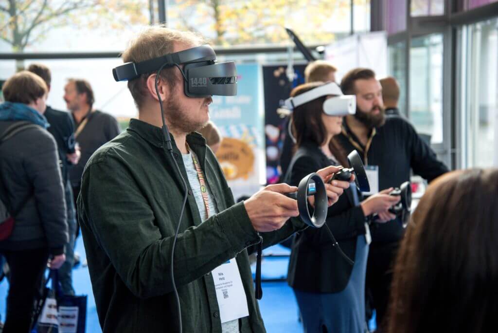 People using virtual reality headsets