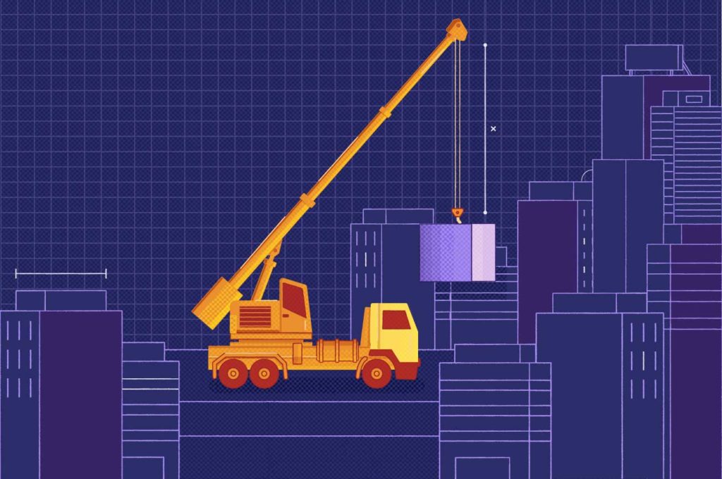 a crane truck carrying a building block